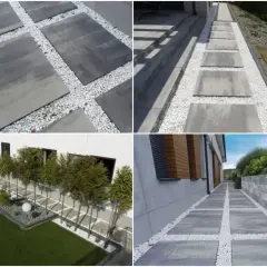 Nowoczesne ścieżki z płyt betonowych i białego żwiru tworzą najtańszą opaskę wokół domu, nadając mu elegancki wygląd.