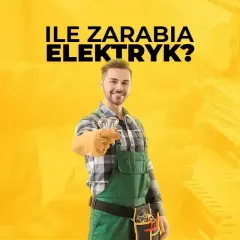 Uśmiechnięty elektryk w zielonym ogrodniczkach trzyma żarówki. Dowiedz się, ile zarabia elektryk i jakie są perspektywy zawodu.