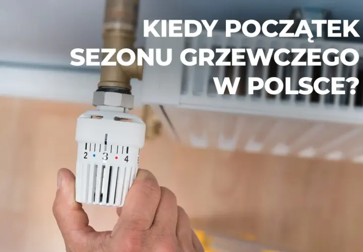 Dłoń reguluje termostat grzejnika, przygotowując dom na zimę. Kiedy zaczyna się sezon grzewczy w Polsce?